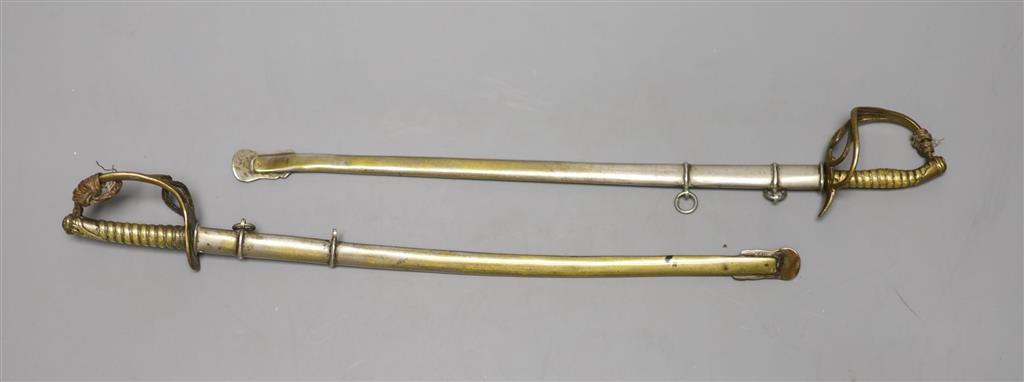 Two early 20th century scale models of late 19th century military swords, longest 24cm